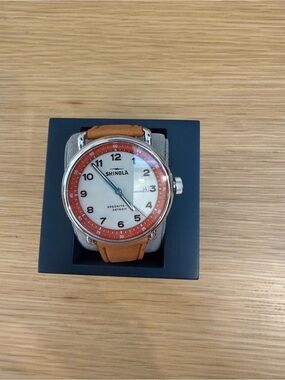 Shinola Men’s Tan Leather Strap Watch with Red Dial Ring and Blue Hands